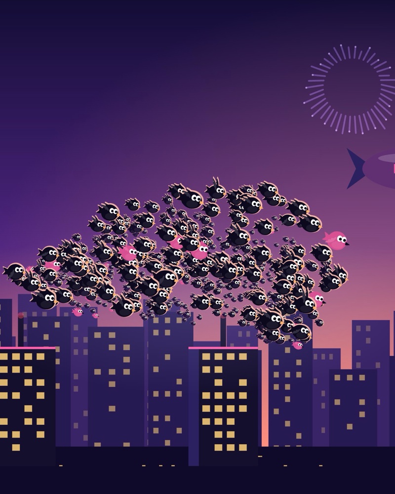A flock of hundreds of little birds sweeping over a city at dusk