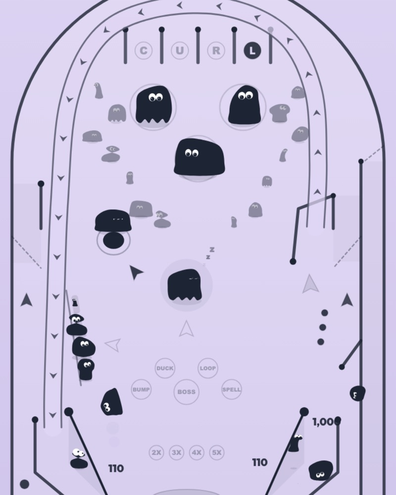 A glowing pinball table with three creature balls in multiball